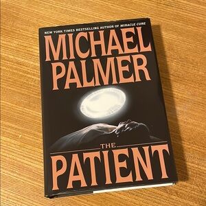 'The Patient' Hardcover Book - Black Cover